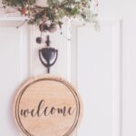 brown wooden welcome wall decor